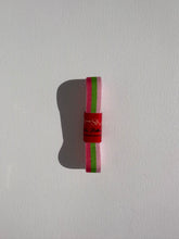 Load image into Gallery viewer, Striped grosgrain premium ribbon roll with bright pinks and green stripes. Add a pop of colour and style to elevate your gift wrapping.