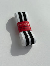 Load image into Gallery viewer, Premium Striped Grosgrain ribbon roll. Stripes include thick black and white stripes. Available in 2.5 metre rolls for stylish gift wrapping.
